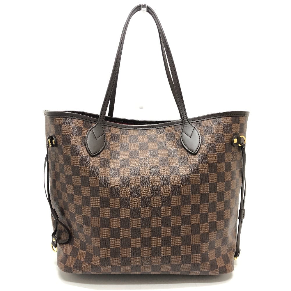 Brown checkered handbag with black handles on a white background