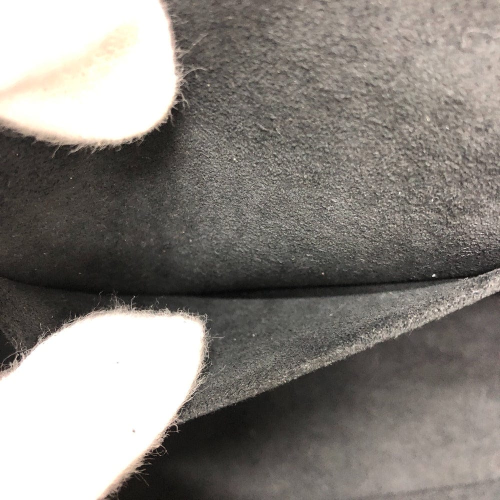 Close-up of dark gray fabric with a textured surface