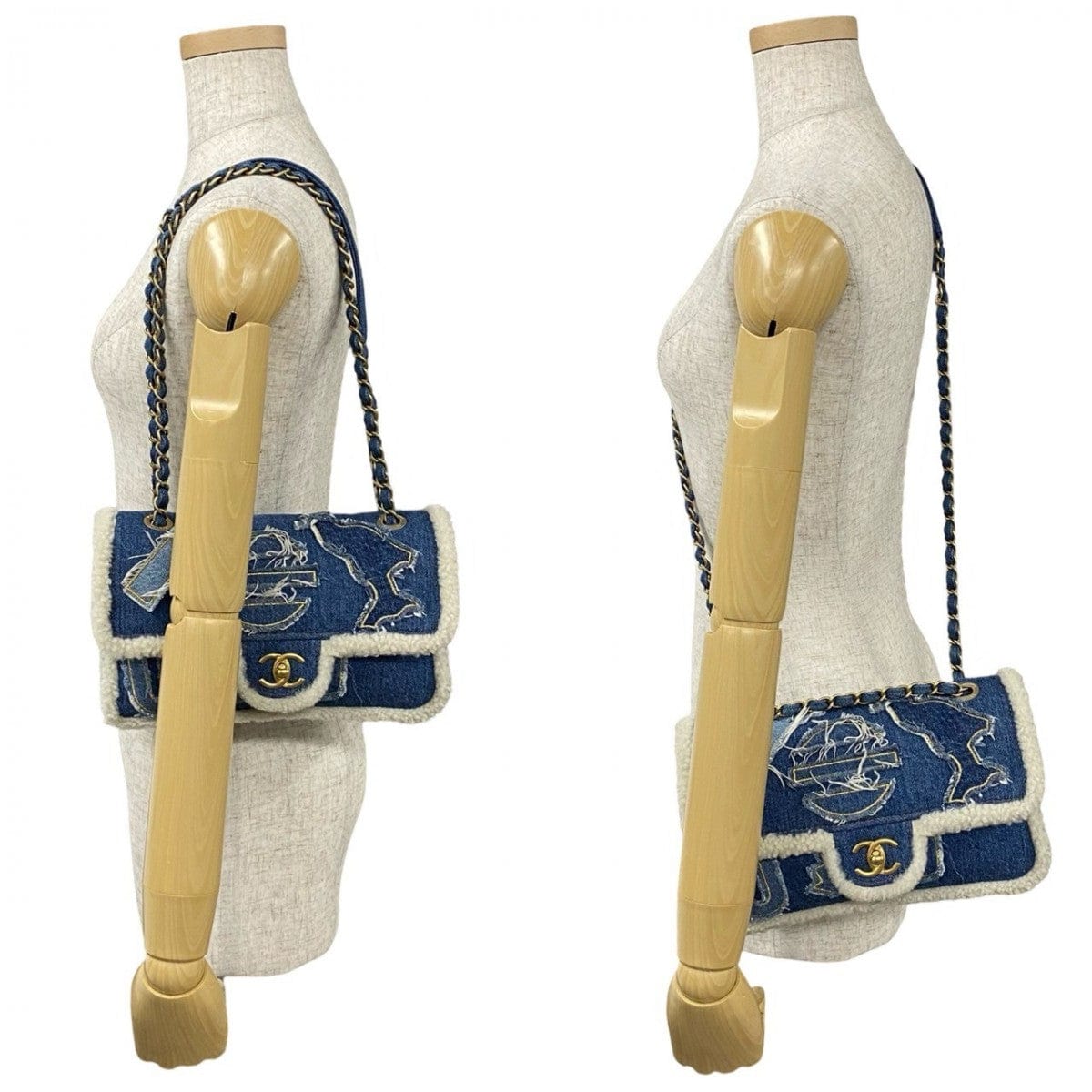 Blue handbag with gold chain strap displayed on mannequin forms.