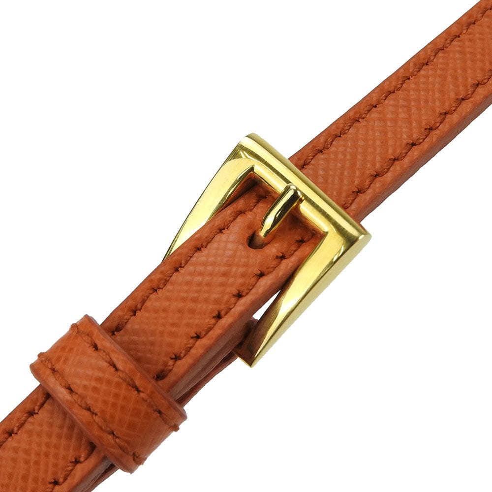 Brown leather belt with a gold buckle on a white background