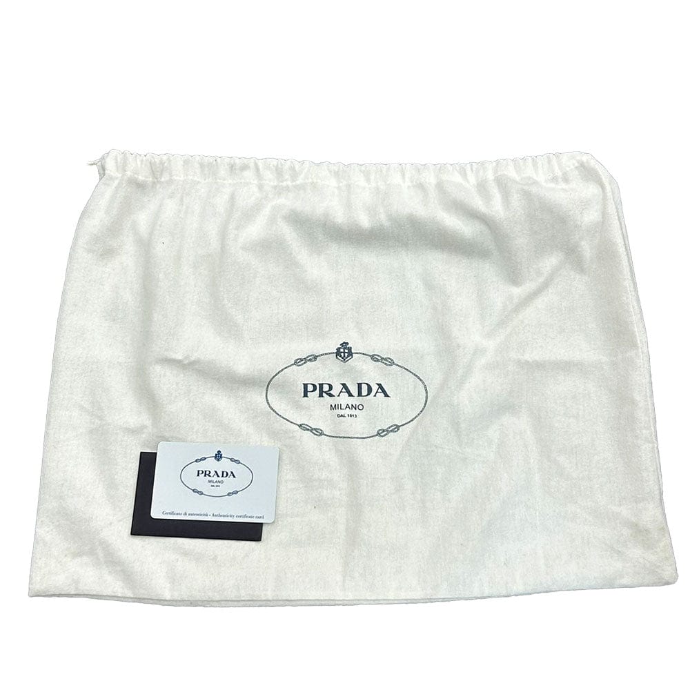 White drawstring bag with Prada logo on a white background