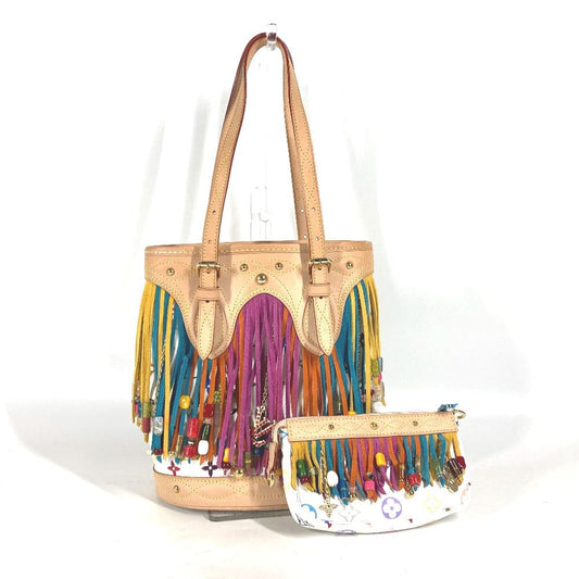 Beige handbag with colorful fringe details on a white background