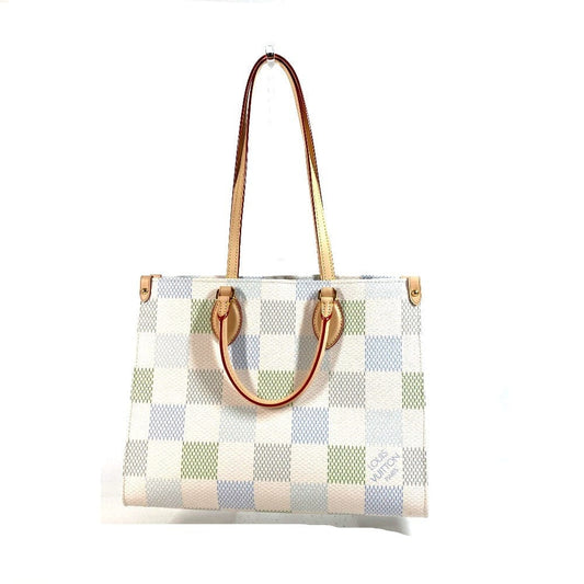 Checkered handbag with brown handles on a white background