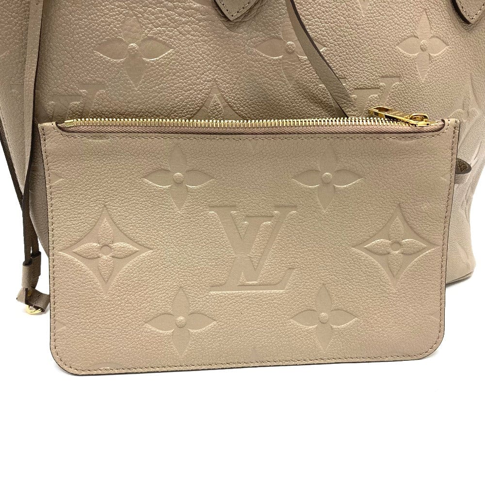 Beige backpack with Louis Vuitton monogram pattern on a white background