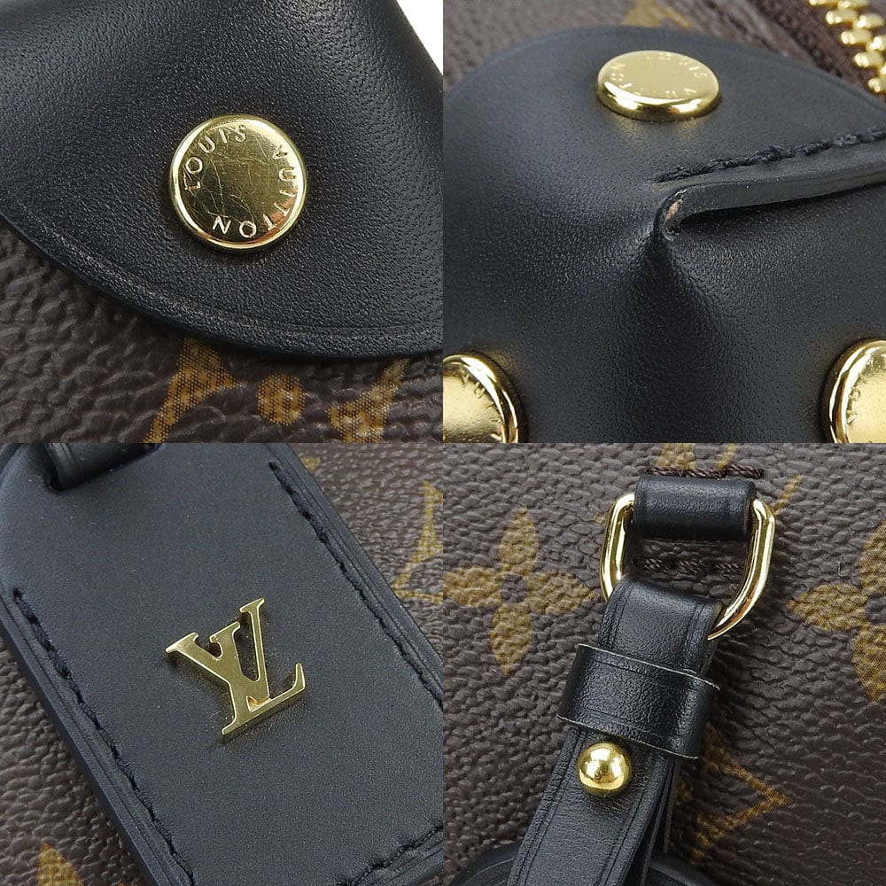 Close-up of a Louis Vuitton handbag with gold hardware and monogram pattern.