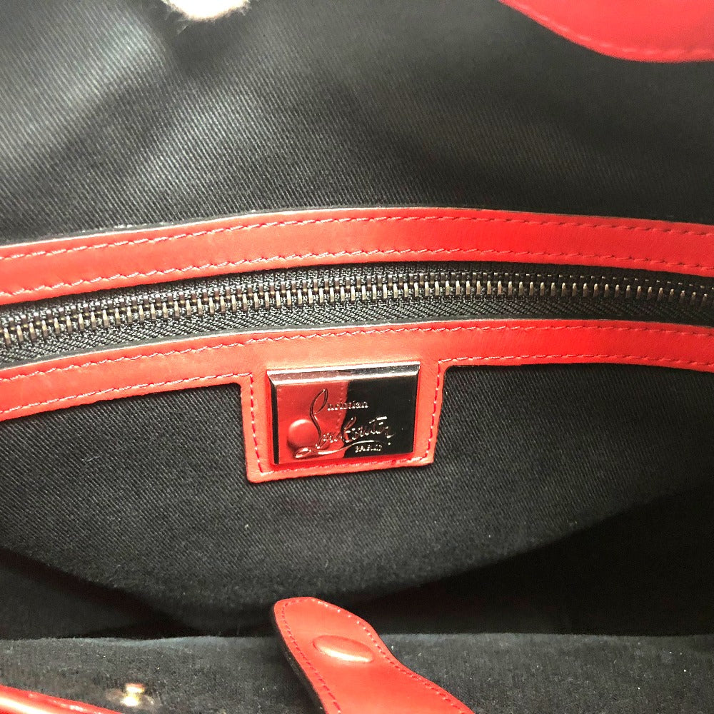 Black bag with red zipper and visible brand logo