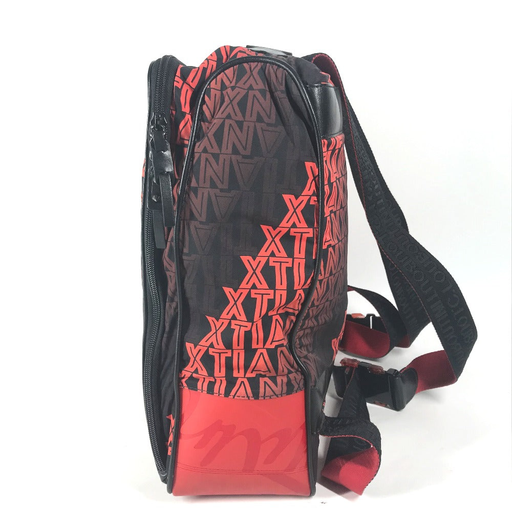 Black and red backpack with geometric pattern on a white background