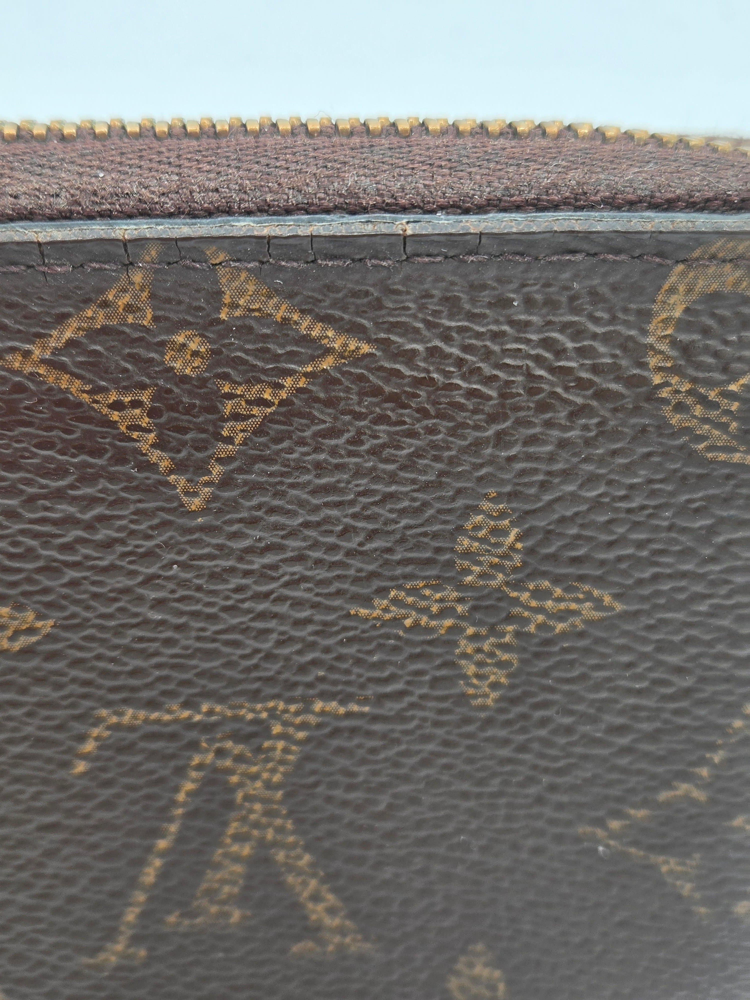 Close-up of a textured surface with a pattern, likely a fabric or leather texture.