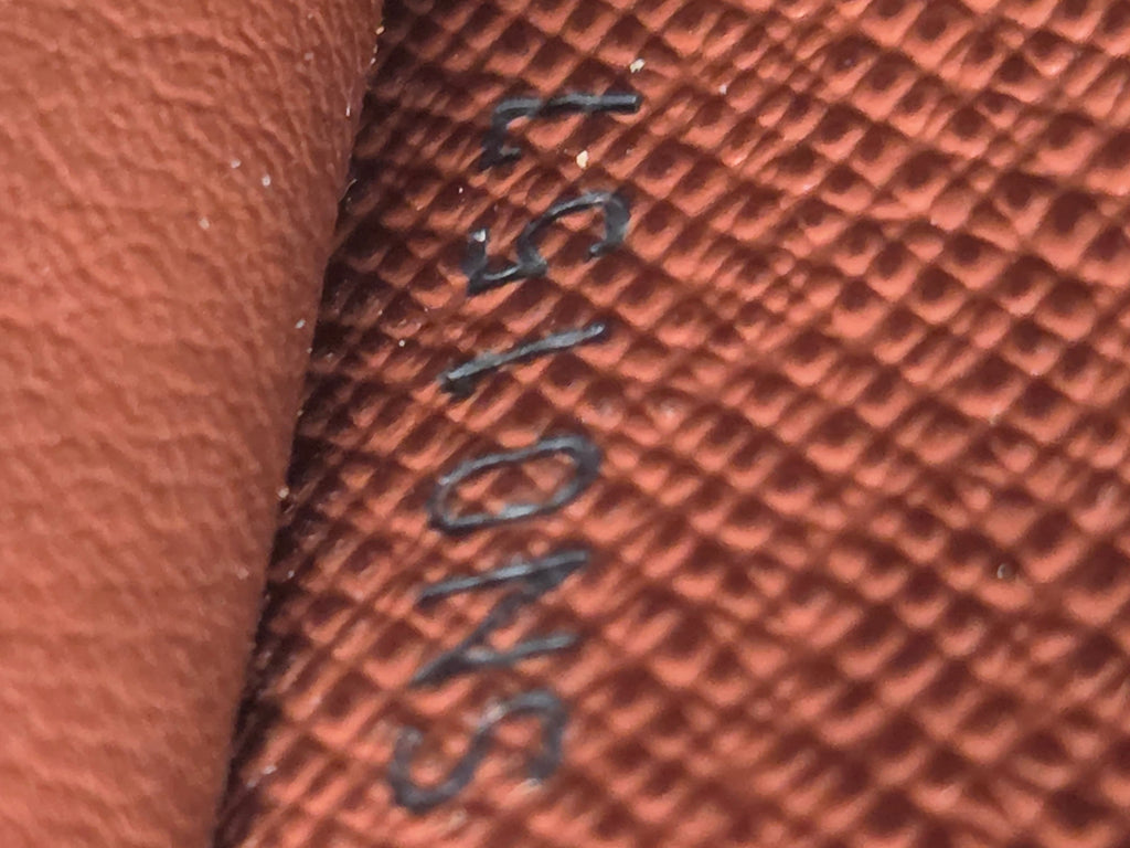 Close-up of brown leather surface with 'Levi's' branding.