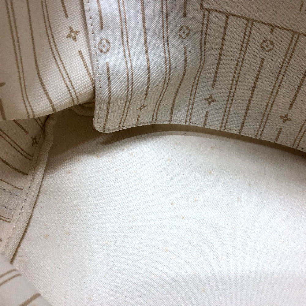 Close-up of beige fabric with subtle pattern