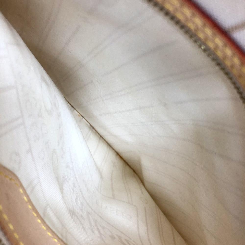 Close-up of beige fabric with a subtle pattern
