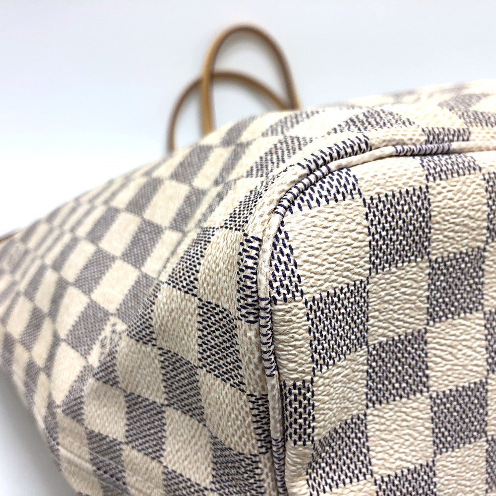 Close-up of a checkered patterned bag with a white background
