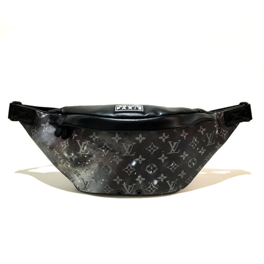 Black and gray patterned waist bag on a white background