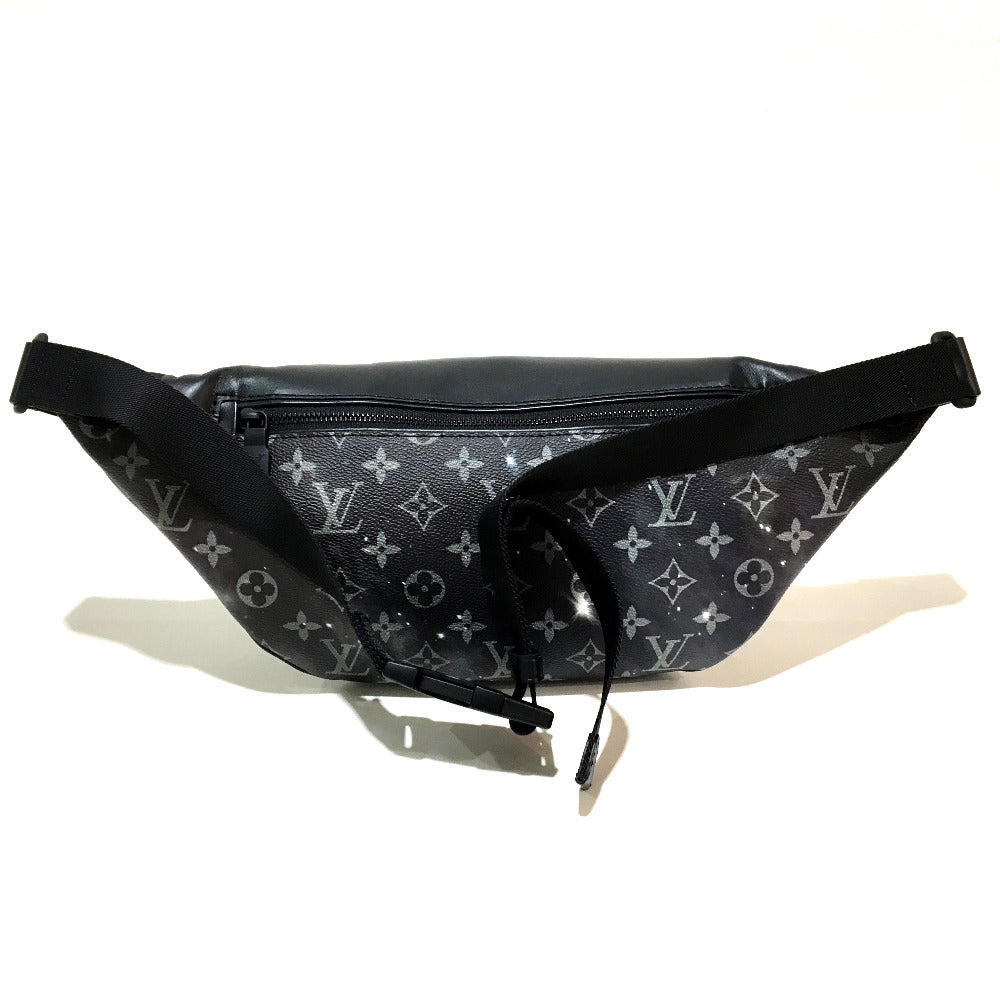 Black waist bag with monogram pattern on a white background