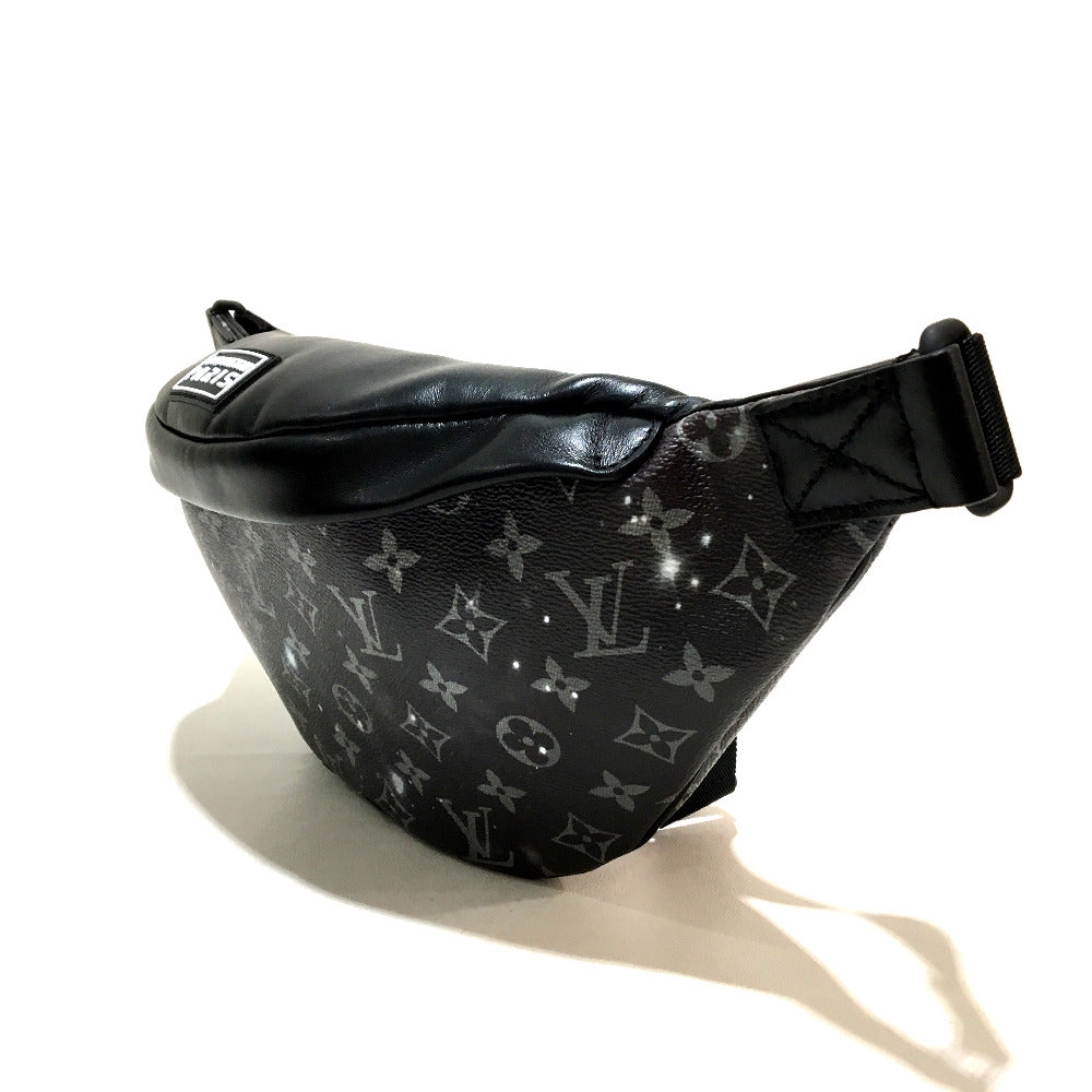 Black patterned waist bag on a white background