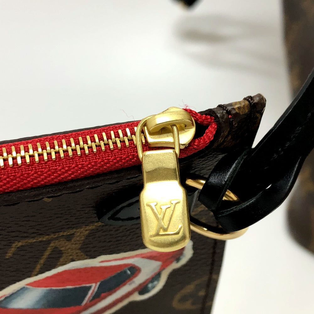 Close-up of a Louis Vuitton bag with a gold zipper pull and red zipper.