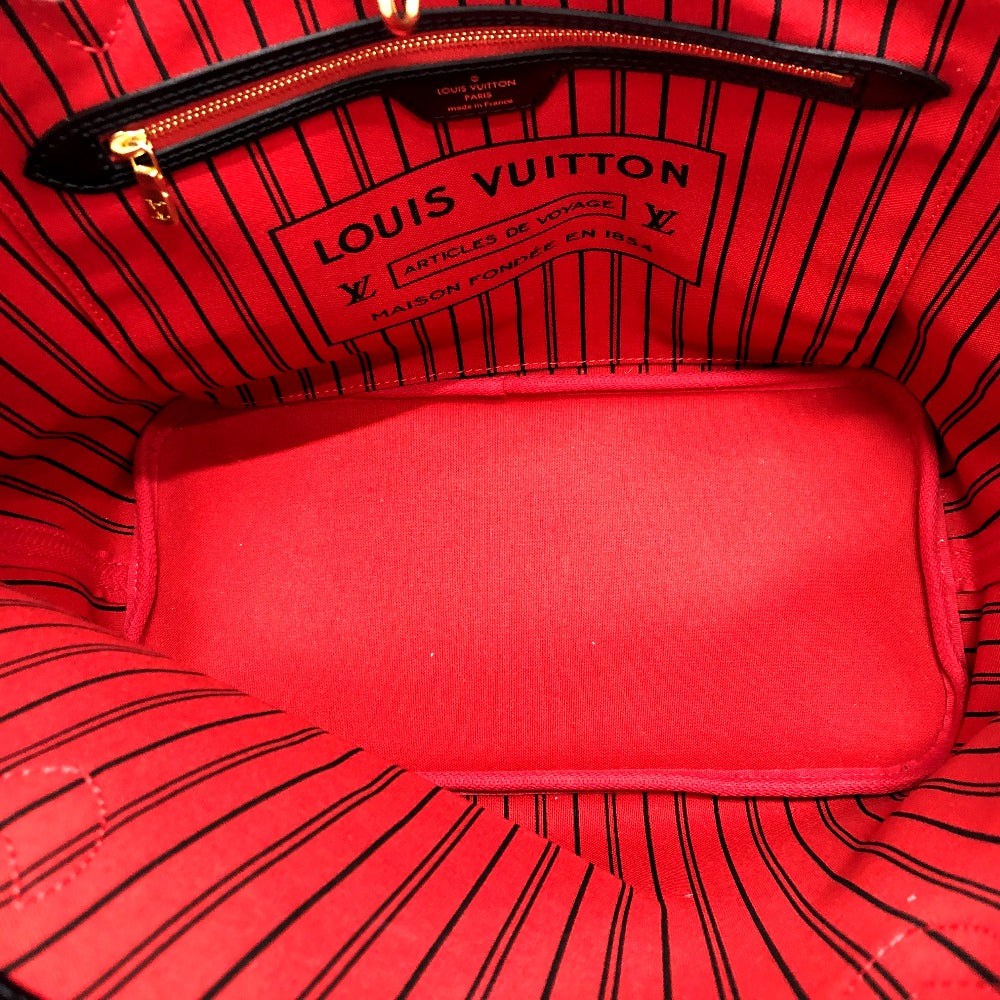 Red Louis Vuitton bag interior with visible logo