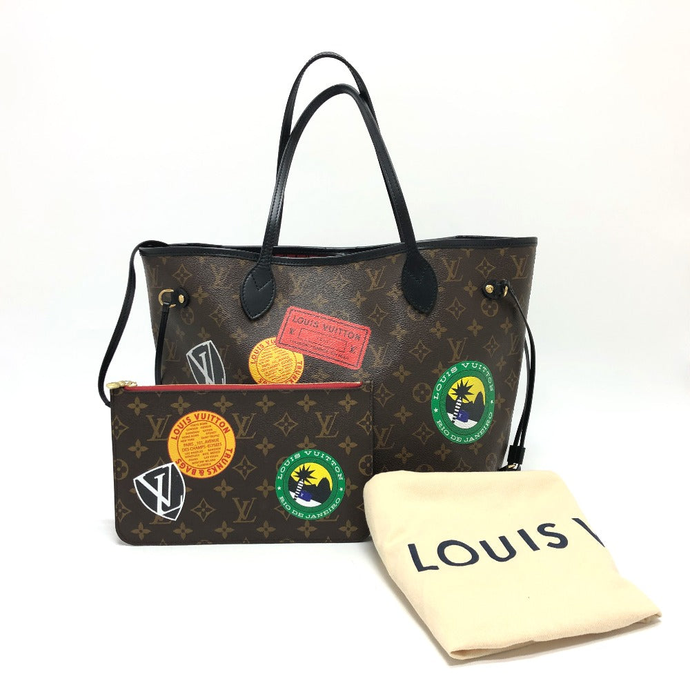 Designer handbag with patches and a matching pouch on a white background