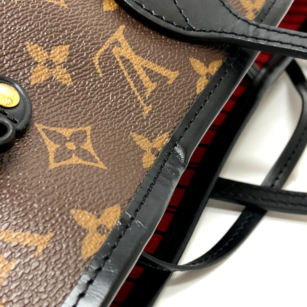 Close-up of a Louis Vuitton handbag with monogram pattern