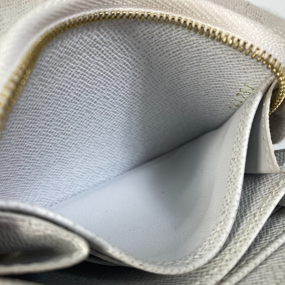 date code Louis Vuitton  Epi Love Lock Zippy Coin Purse White
