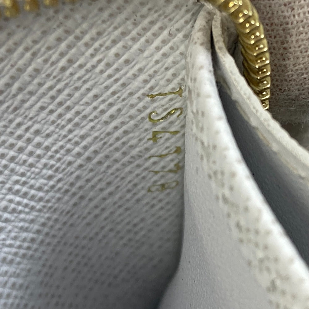 date code close up Louis Vuitton  Epi Love Lock Zippy Coin Purse White
