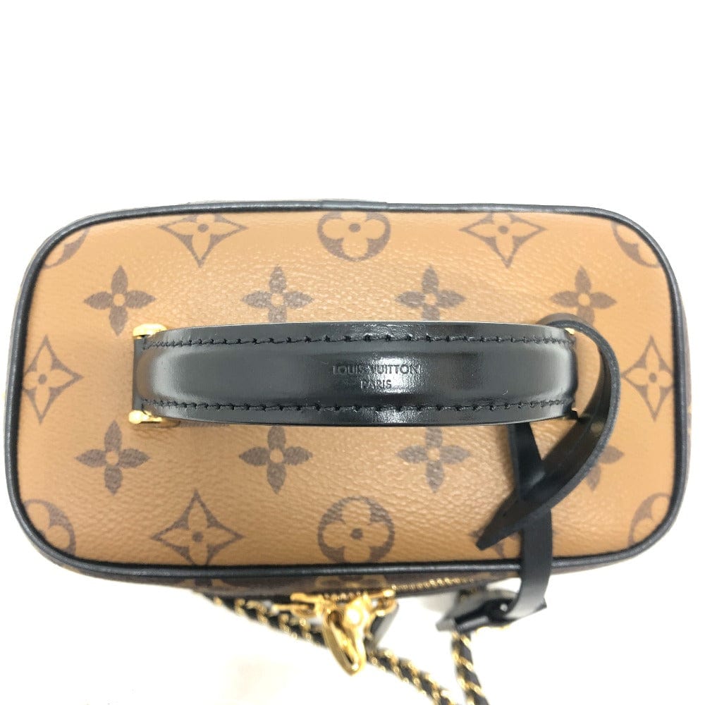 Louis Vuitton handbag with monogram pattern on a white background