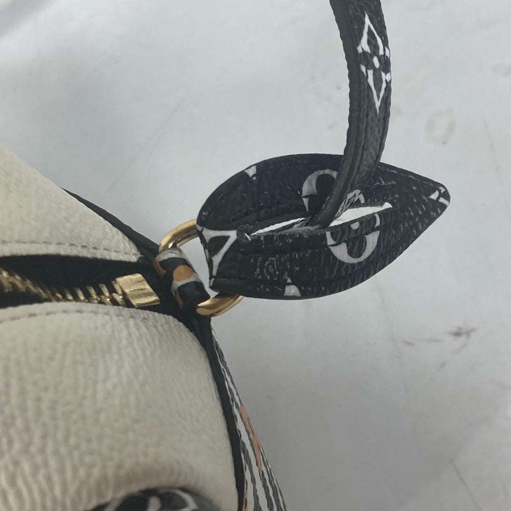 Close-up of a cap with a black brim and gold buckle on a white background