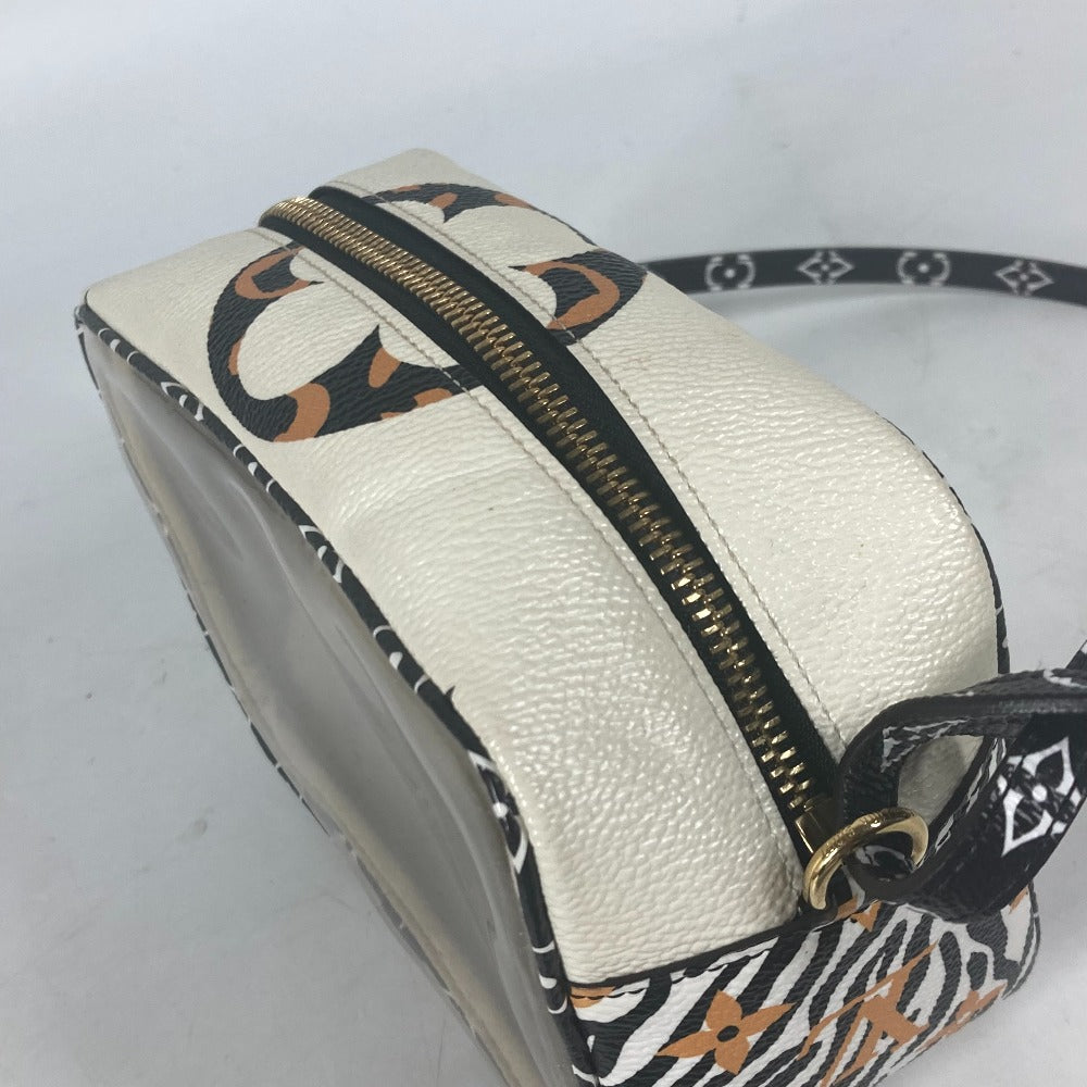 White handbag with black and brown patterned strap on a white background