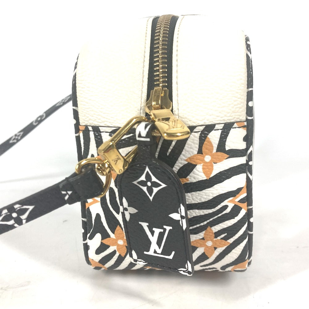 Small pouch with floral pattern and gold zipper, attached to a matching keychain with brand logo.
