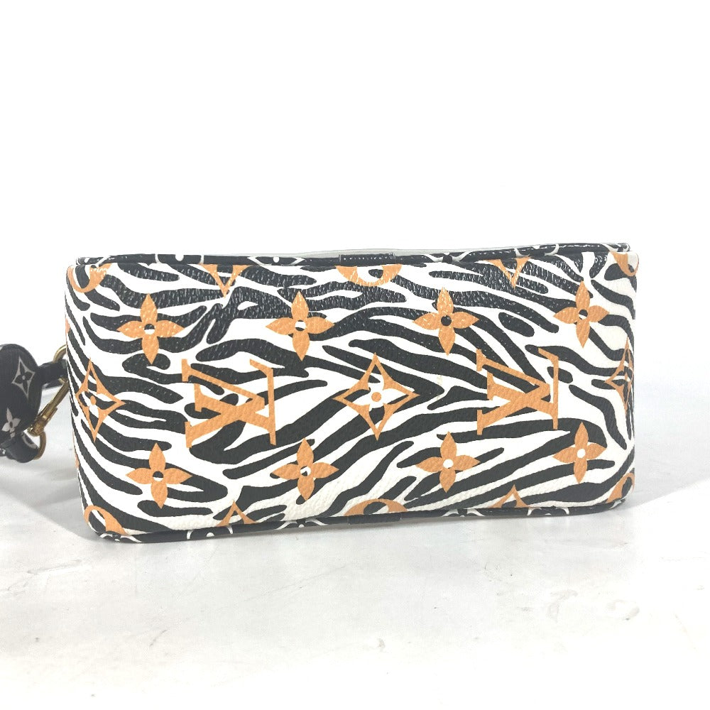 Designer handbag with zebra pattern on a white background