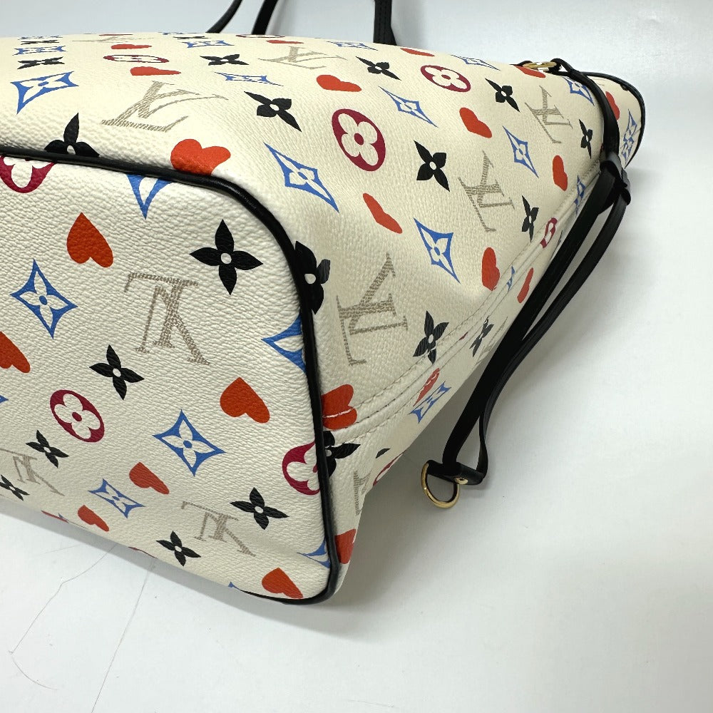 Designer handbag with colorful monogram pattern on a white background