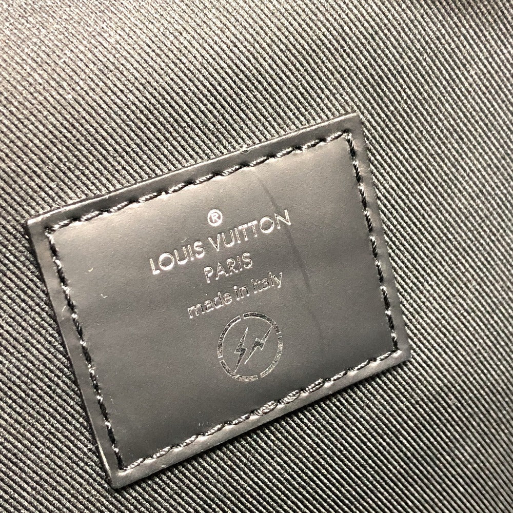 Louis Vuitton label on a textured fabric surface