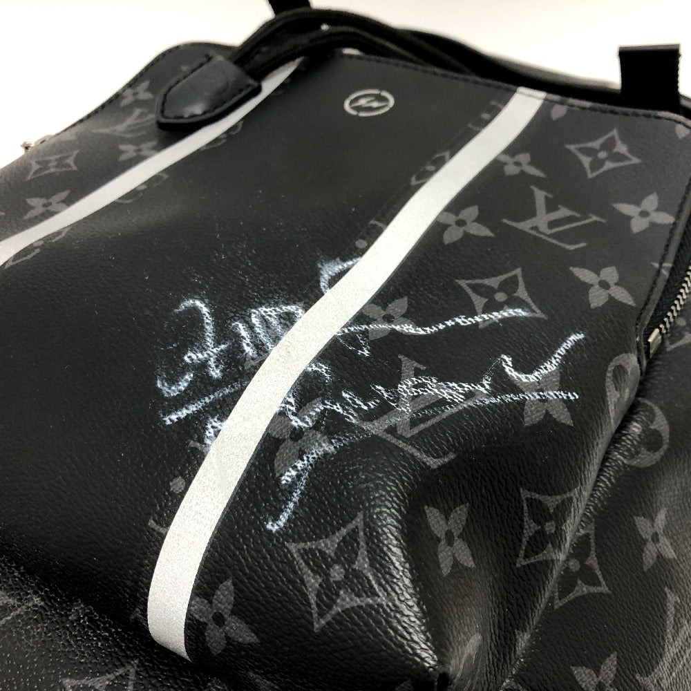 Black handbag with white monogram pattern on a white background