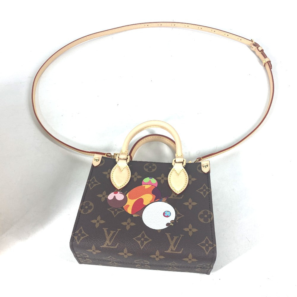 Designer handbag with colorful character design on a white background