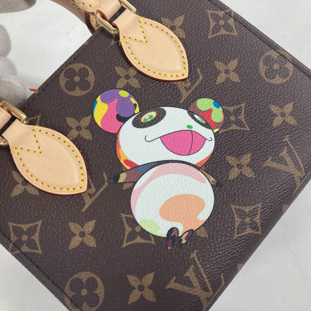 Louis Vuitton wallet with a colorful panda charm on a white background