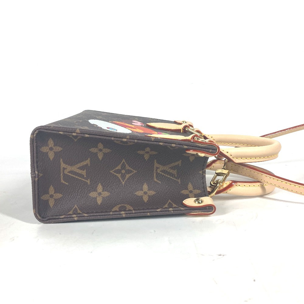 Designer handbag with monogram pattern on a white background