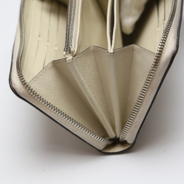 side edge Louis Vuitton Mahina Leather Long Zippy Wallet Ivory