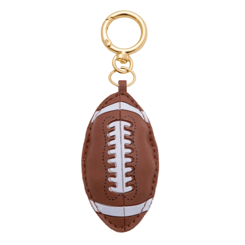 Football-shaped keychain with gold ring on a white background