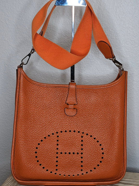 Pre-Loved Hermes Evelyne Clemence Leather 29 Orange and Palladium