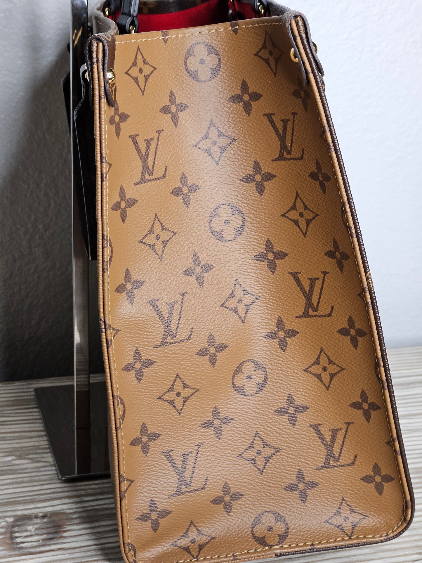 Pre-Loved Louis Vuitton Reverse Large Monogram On The Go MM "Sold Out "