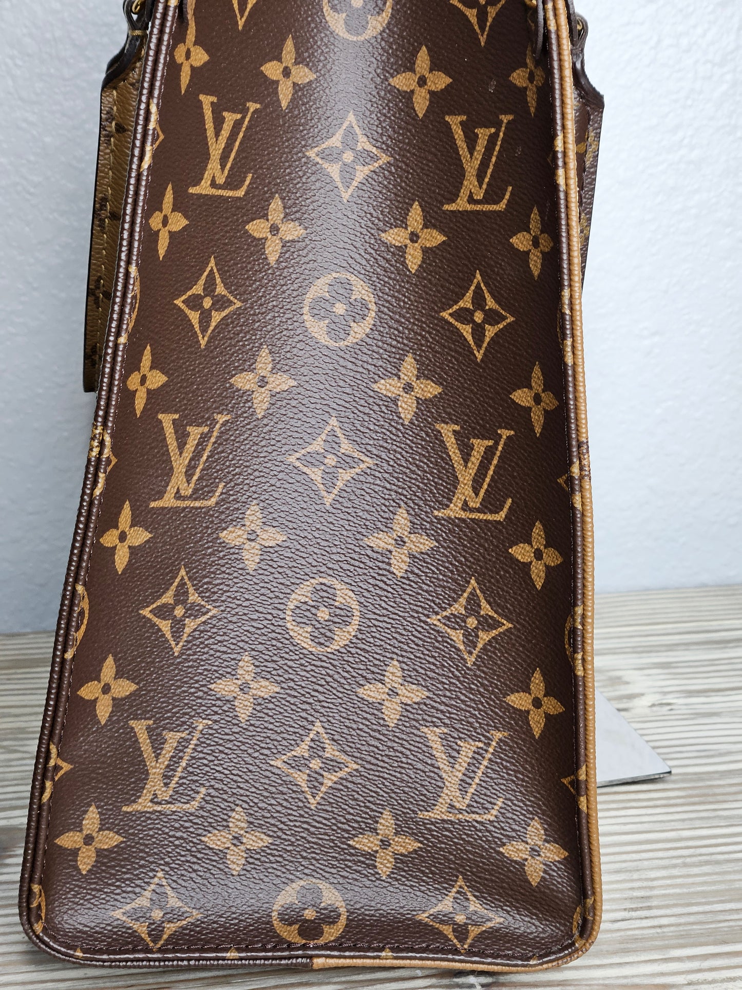 Pre-Loved Louis Vuitton Reverse Large Monogram On The Go MM "Sold Out "