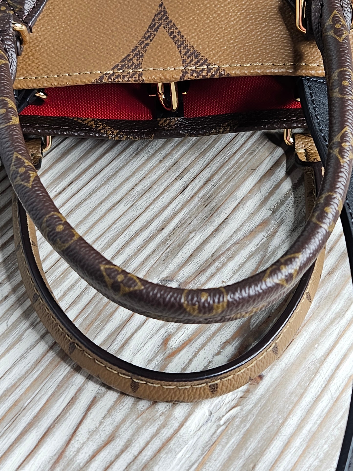 Pre-Loved Louis Vuitton Reverse Large Monogram On The Go MM "Sold Out "