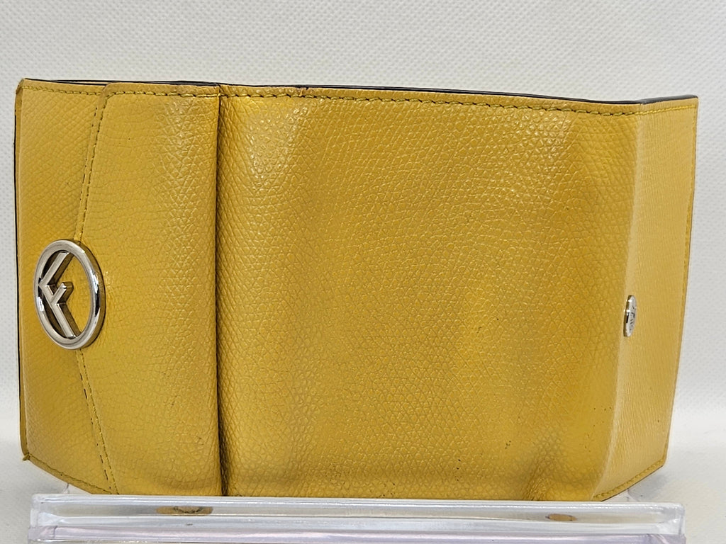 Yellow wallet with a brand logo on a white background