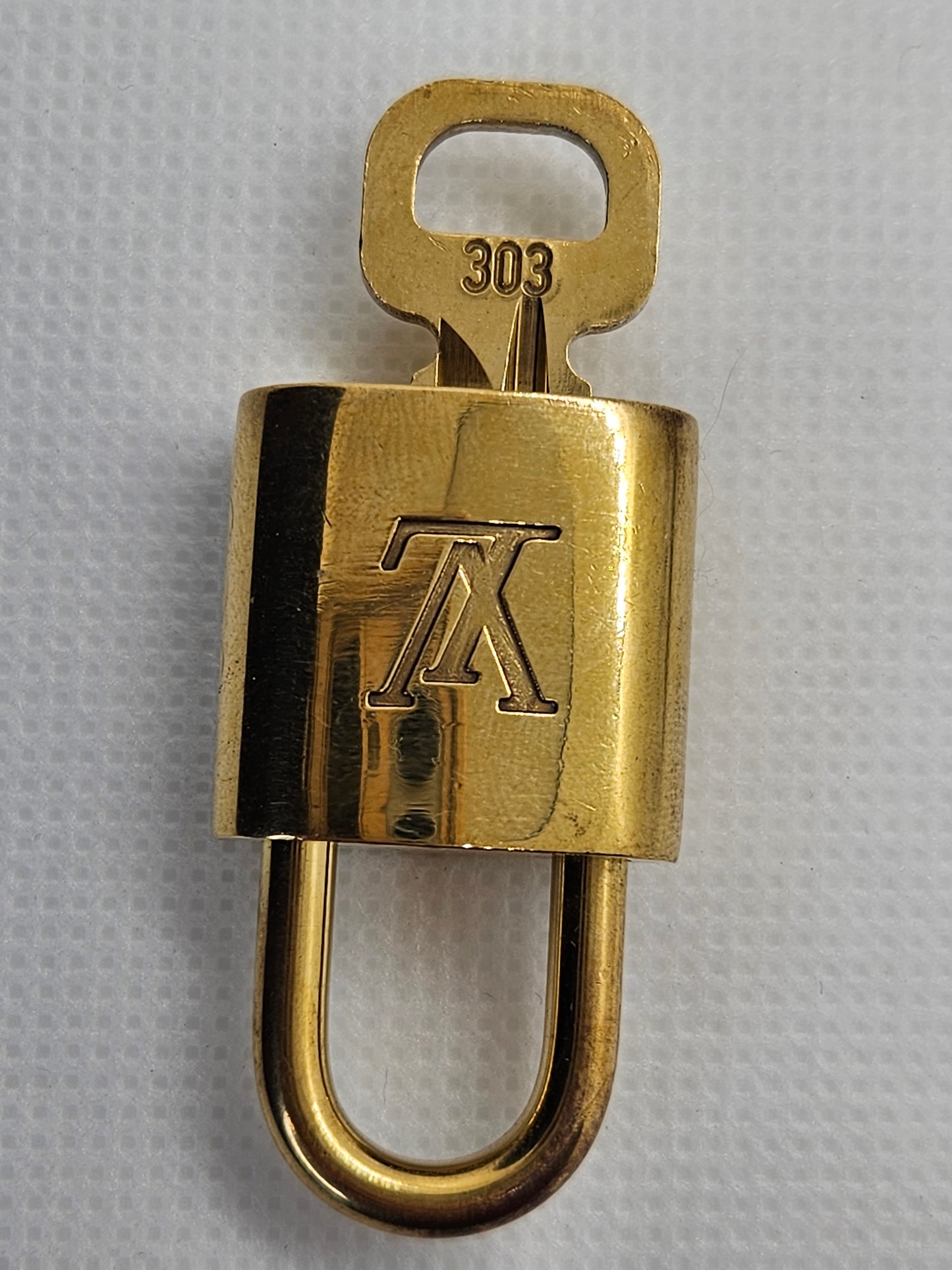 Pre-Loved Louis Vuitton Gold Lock and Key Set