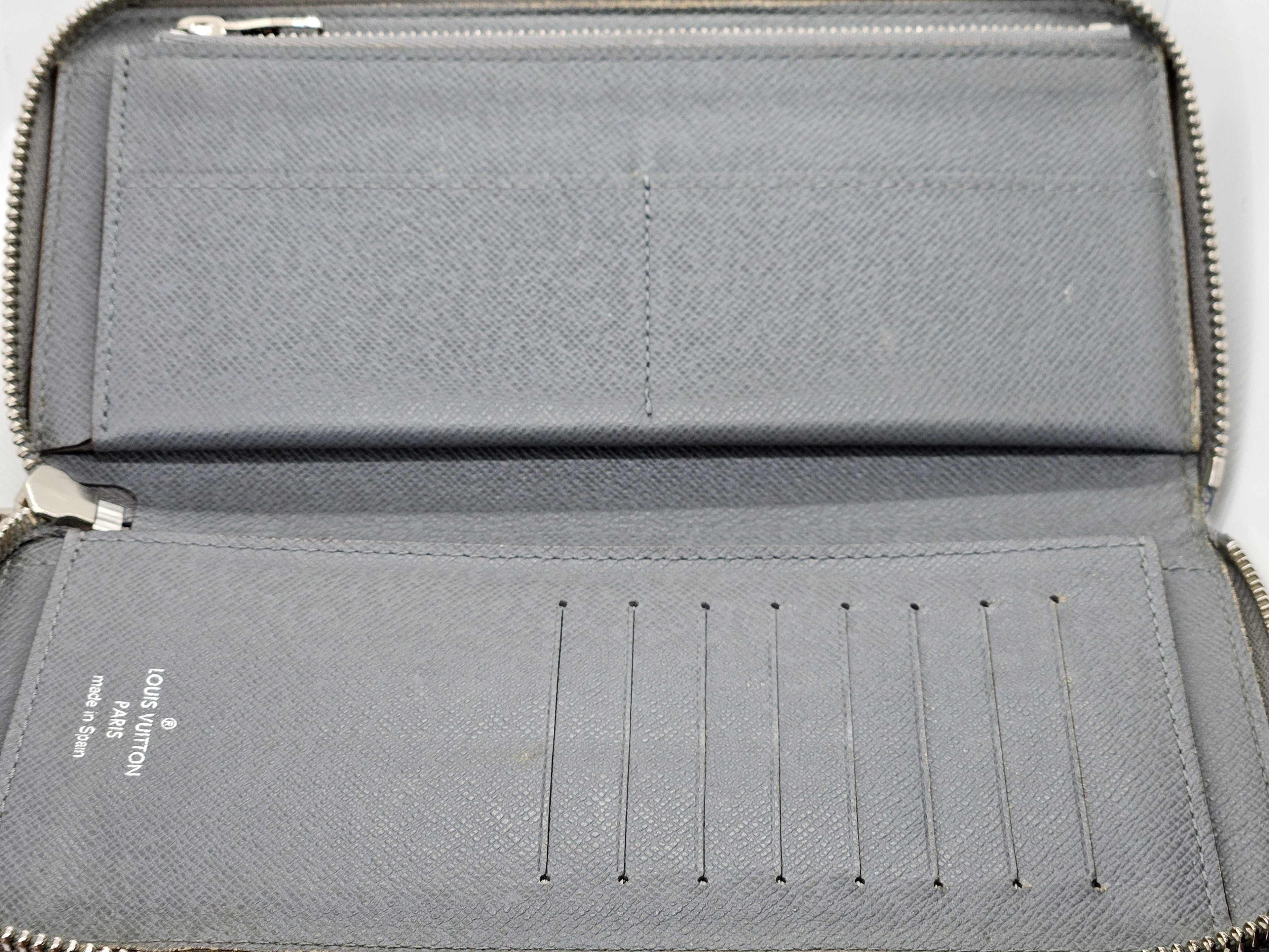 Louis Vuitton Zippy Vertical Wallet – Taiga Leather Ardoise | Pre-Owned