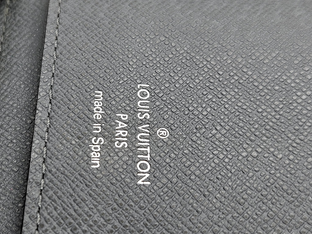 Louis Vuitton Zippy Vertical Wallet – Taiga Leather Ardoise | Pre-Owned
