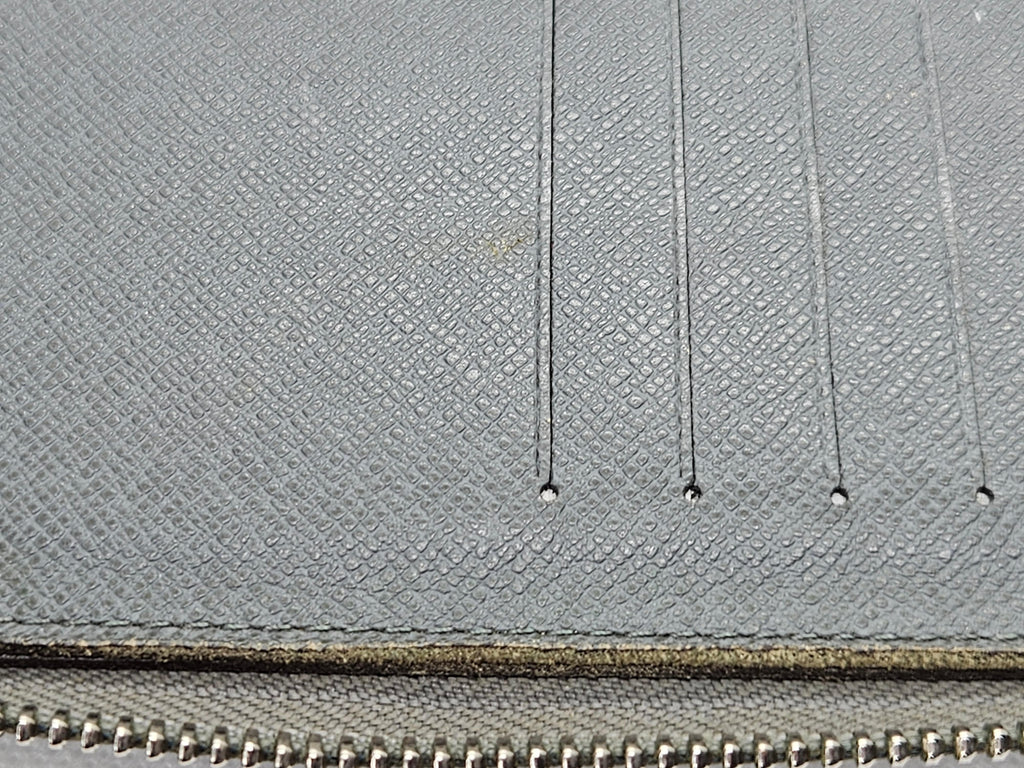 Louis Vuitton Zippy Vertical Wallet – Taiga Leather Ardoise | Pre-Owned