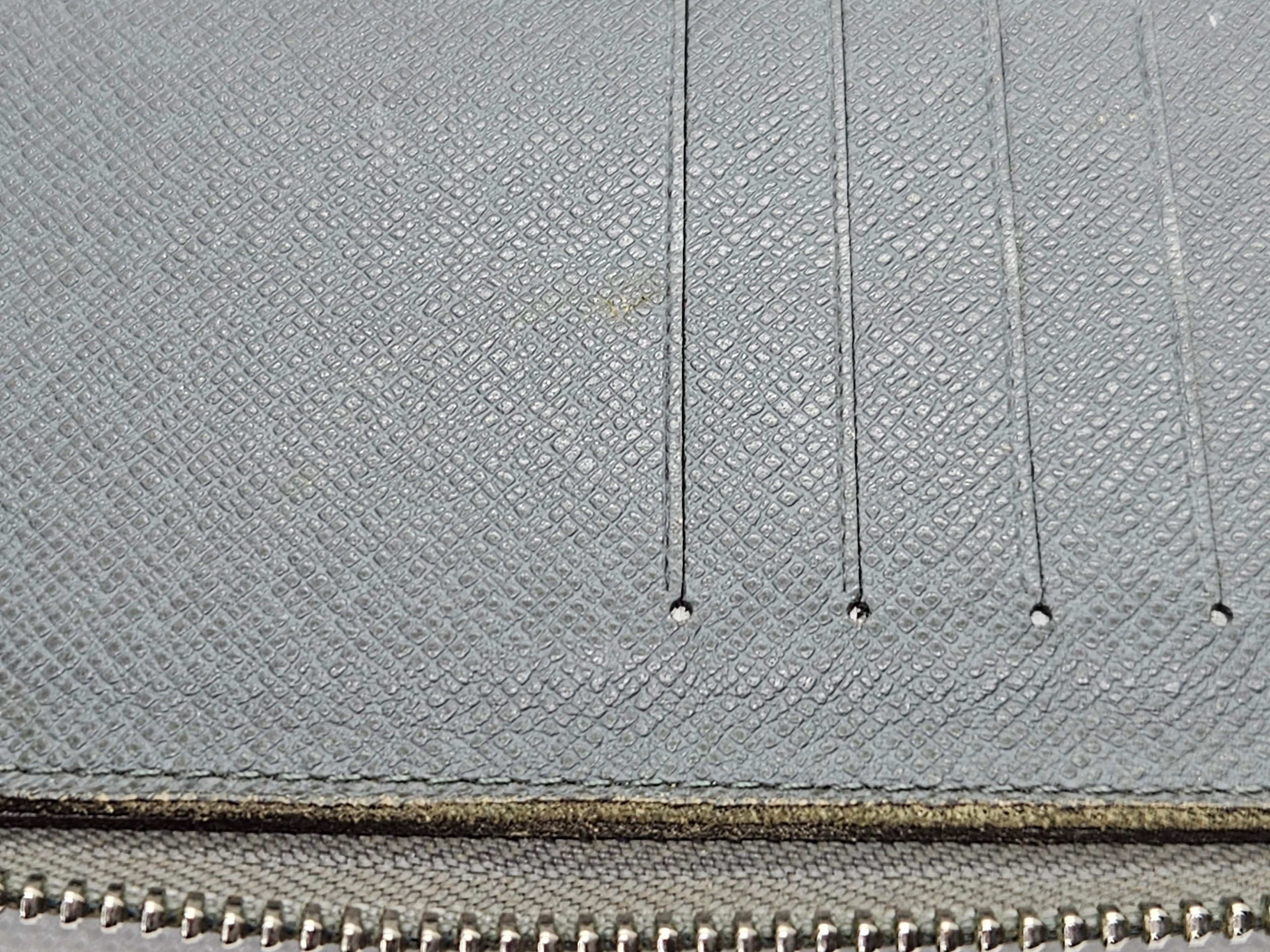Louis Vuitton Zippy Vertical Wallet – Taiga Leather Ardoise | Pre-Owned