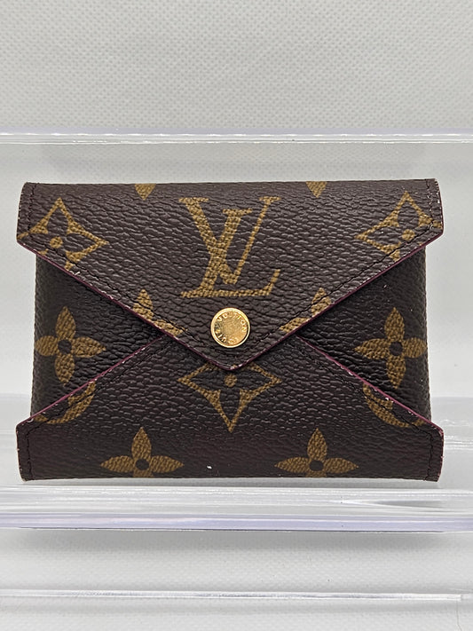 Pre-Loved Louis Vuitton Kirigami Monogram Small Pochette