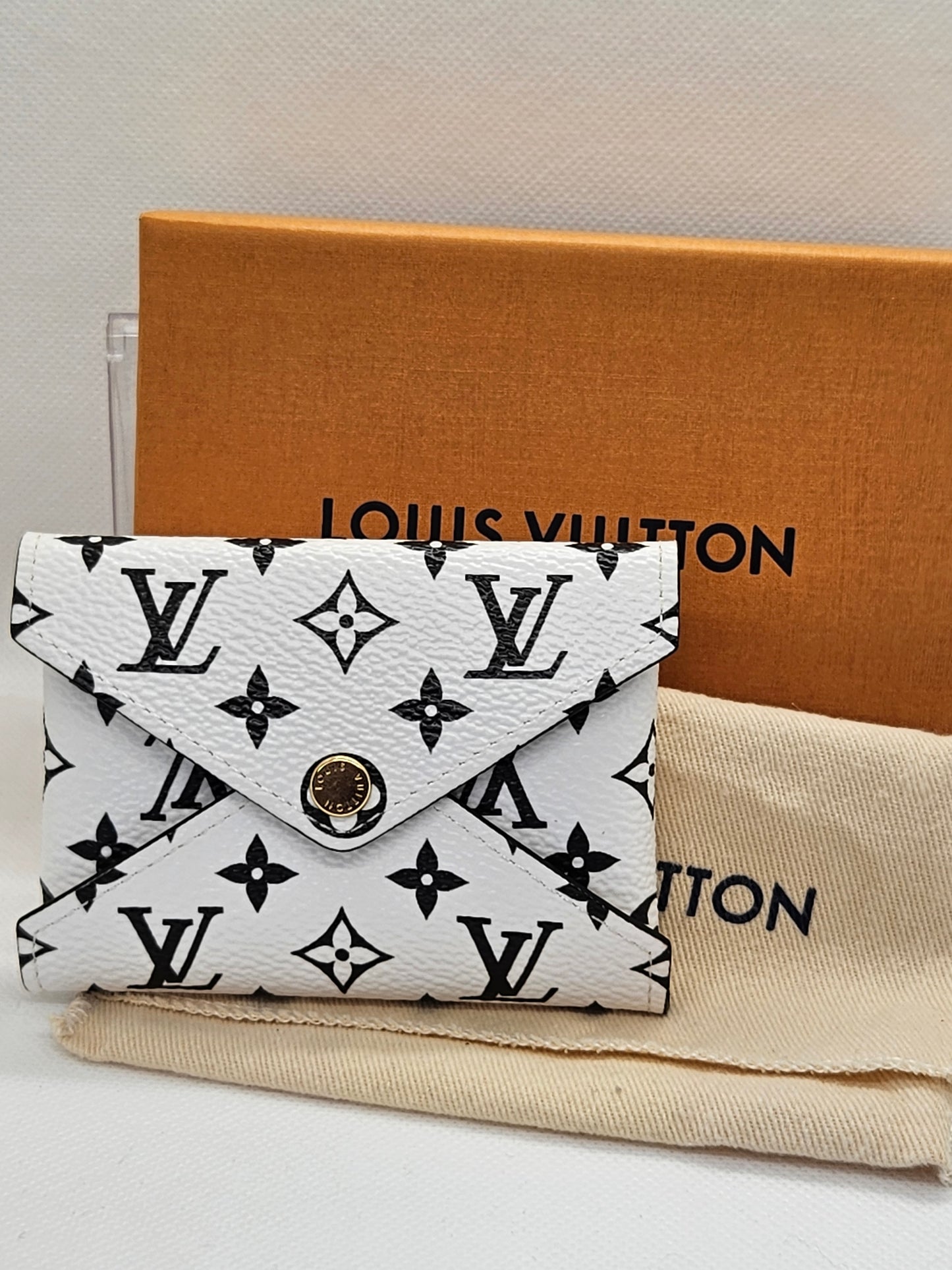 Pre-Loved Louis Vuitton Giant Monogram Kirigami Pochette Small "Sold Out"